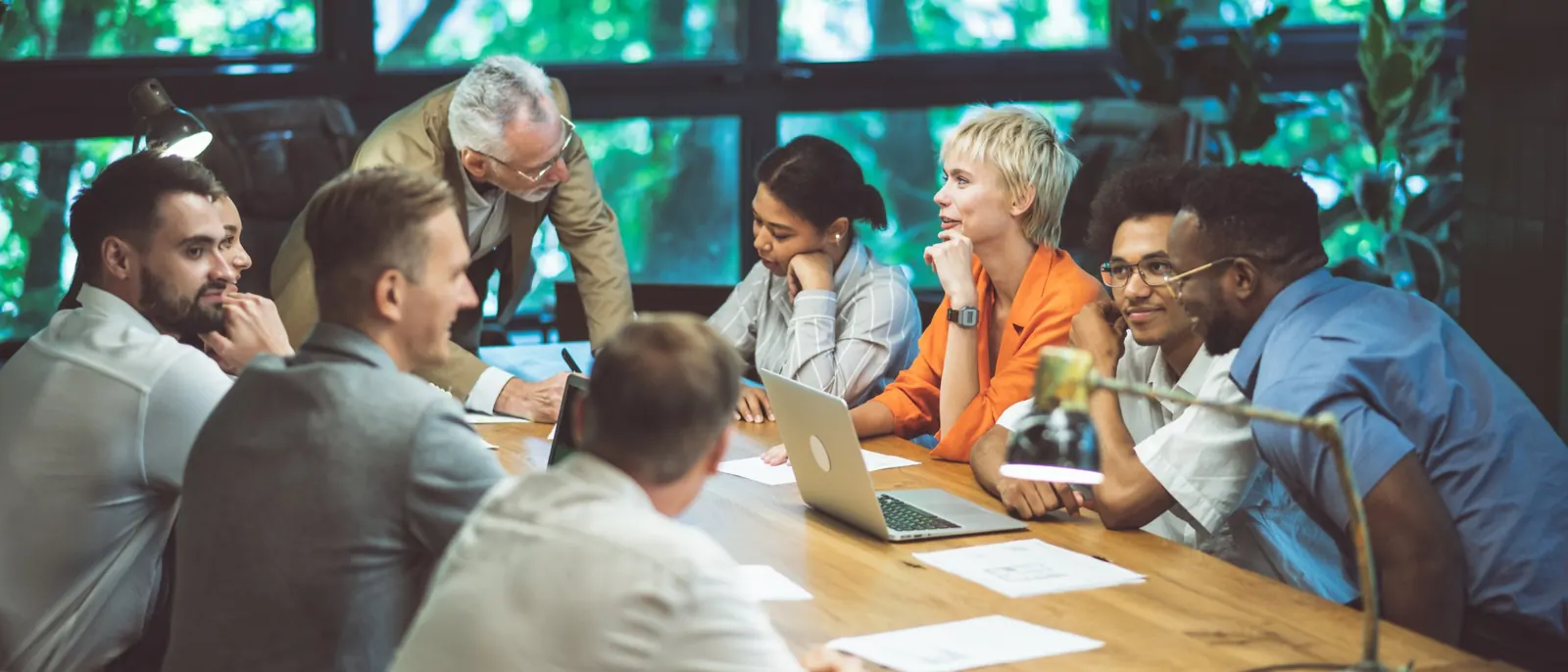 A group of business owners working through an issue together around a table